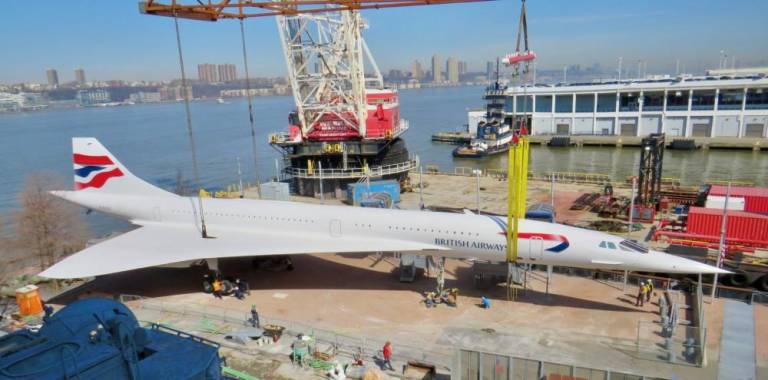 A two hour crane lift ended the Concorde’s two day journey by water following its seven month rehab at the Brooklyn Navy Yard. The touchdown went flawlessly.