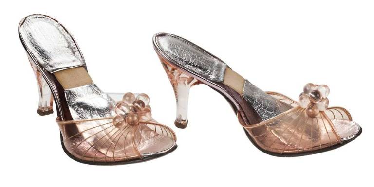 Fenton Last, maker. Saks Fifth Avenue (founded 1924), retailer. Peep-toe mules, mid-1950s. Plastic, Lucite, leather, elastic Spring-o-lator. Stuart Weitzman Collection, no. 84. Photo: Glenn Castellano, New-York Historical Society