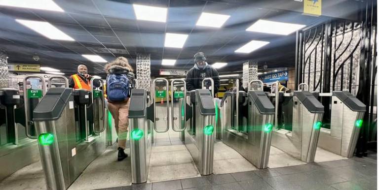 New fare gates, ordered by NYC Transit prior to the rise in fare evasion, may be a possible solution to combat fare evasion. Here at the Sutphin Boulevard Station in Jamaica Queens,wider entrances make it easier for passengers to navigate them. Despite a social media post showing how to compromise them, fare evasion here has been reduced by 20 percent the MTA said. Photo: Ray Raimundi/MTA