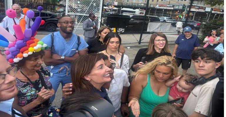 Gov. Kathy Hochul was mobbed by photobombers as she made a surprise appearance at the 13th Precint’s National Night Out Against Crime at Peter’s Playground on 20th St. and Second Ave. on Aug. 4.