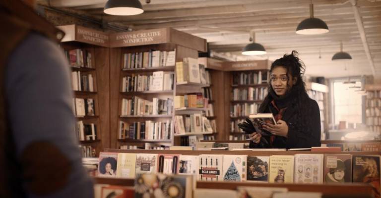 A meeting in a bookstore: still from “Deceive,” with actress Dandara Veiga. Photo courtesy of Severine Reisp