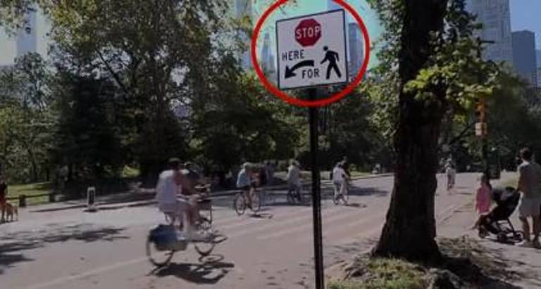 Bikers frequently ignore traffic signals, including stop signs such as the one above, in Central Park. The NYPD has yet to reveal how it plans to enforce the new 15 mph speed limit on e-bikes, which goes into effect on Oct. 24.