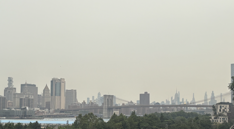 July 16 haze on looking over the Brooklyn Bridge into Manhattan.