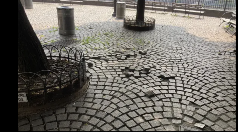 Loose paving stones are scattered across the East 72nd Street Overlook, and a number of area residents say they have injured themselves after falling over the loose pavers.