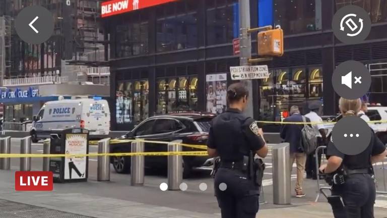 In a matter of minutes, an emotionally disturbed 49-year-old woman was shot dead by cops in Times Square after she stabbed two victims, one fatally, and then refused to drop her weapons when confronted by cops around 4:30 p.m. on Aug. 31.
