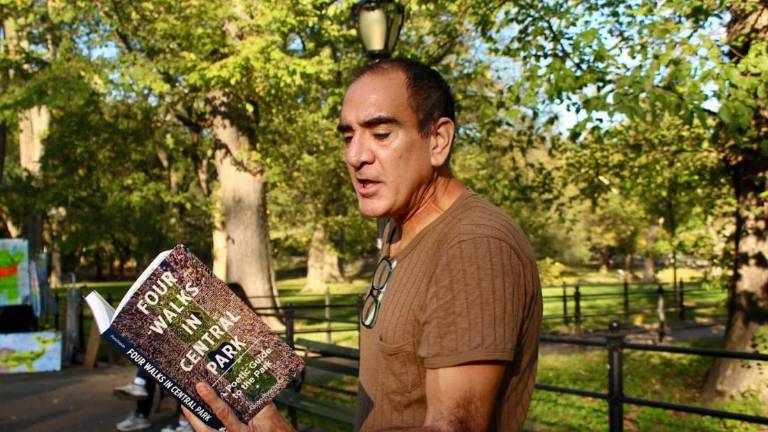 Aaron Poochigian reads from his recently published <i>“Four Walks in Central Park.”</i> He said meditative walks through Central Park helped him overcome an addiction to cocaine and eventually led to the publication of a guide book to the park that saved his life, written entirely in iambic pentameter.