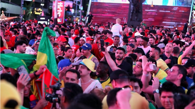 Futbol fans piled into Times Square on Friday, June 12 to watch FIFA World Cup games where the USA Men’s National Team beat Paraguay 4 to 1.