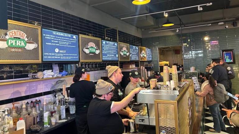 There are a lot more baristas behind the counter at Central Perks–a new cafe that draws its name from the fictional coffee house in Friends–than there were in the tv version that ran for ten years on NBC and is now in syndication. It’s a full functioning cafe that borrows a famous name from a tv show.