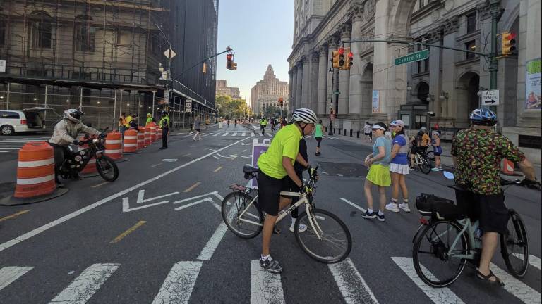 Exitin the Brooklyn Bridge onto Centre Street during Summer Streets, August 2025.