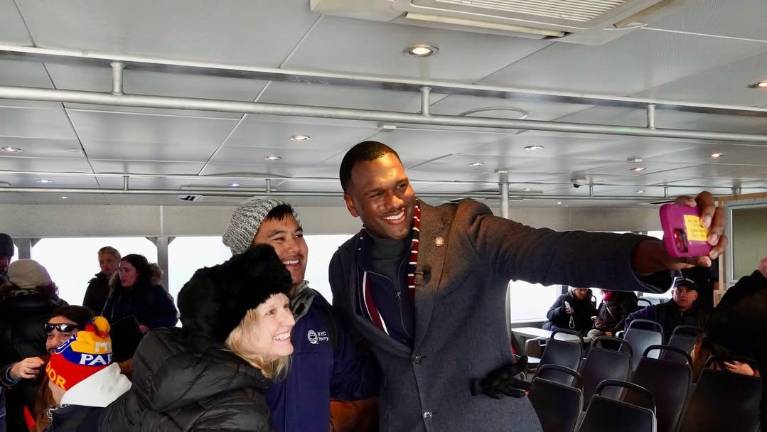 State Assembly Member Charles D. Fall celebrating new NYC Ferry routes on Dec. 8, 2025.