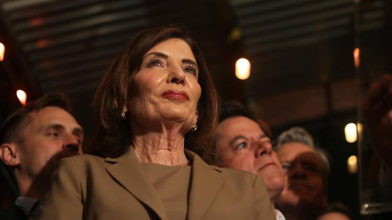 Most establishment Democrats backed Lasher, including Gov. Kathy Hochul, who made a surprise appearance at his watch party.
