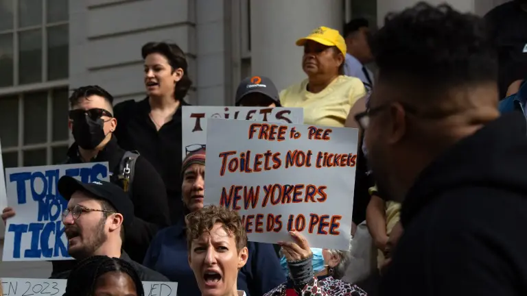 Homeless rights and community advocates rally on the steps of City Hall in favor of a pair of bills to increase the number of publicly accessible bathrooms across the five boroughs, Sept. 19, 2024.