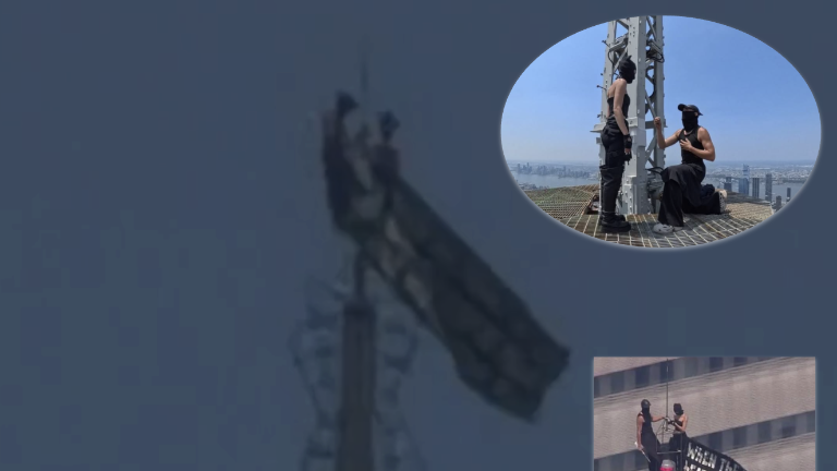 Two daredevil climbers who scaled the Empire State Building and unfulred a peace banner atop the building’s needle were arrested by the NYPD on July 1.