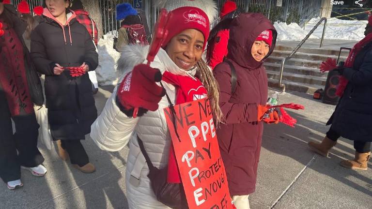 This nurse on the picket line outside Mount Sinai Wesst said she was campaigning for PPE: pay, protection of health benefits and enough staff to keep nurses and patients safe.