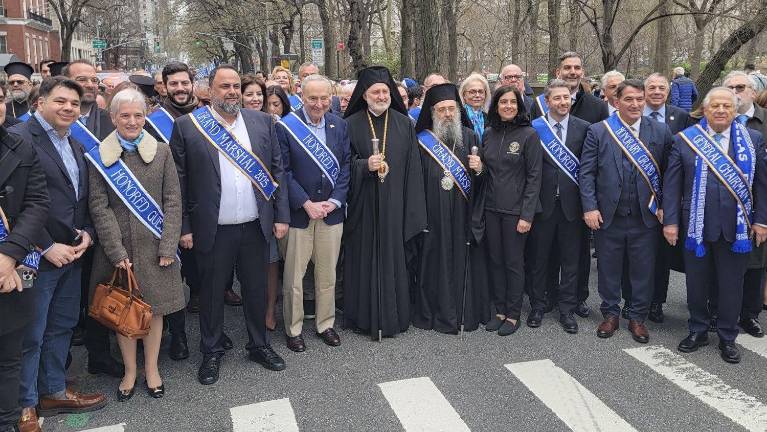Senator Charles Schumer (in tan trousers), Congresswoman Nicole Malliotakis (in all black), and Greek Orthodox Church leaders get ready to march up Fifth Avenue for the Greek Independence Day parade.