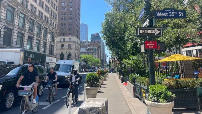 The Sixth Avenue bike lane, which the Mamdani Administration is set to widen, is currently one of the busiest in the city, with many New Yorkers and visitors utilizing the lane each day. (Photo: Jacqueline Gordon)
