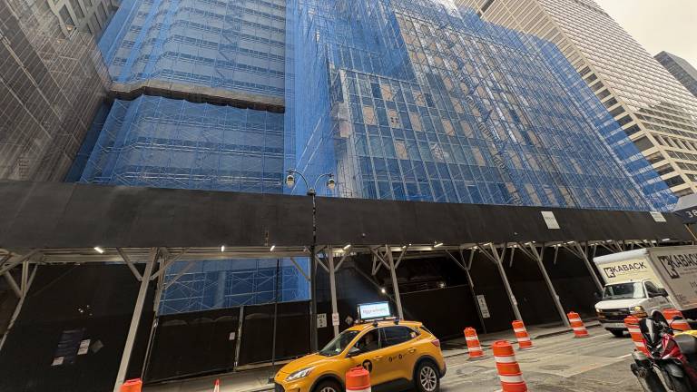 Half of the block cornered by Park Avenue and East 51st street is now covered in blue netting as demolition for 350 Park Avenue begins.