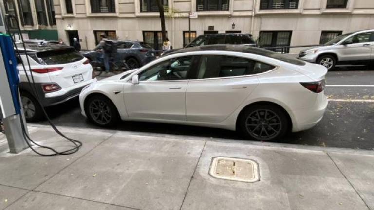 Another electric vehicle parked in the charging spot without using it. Photo: Tom Goodman