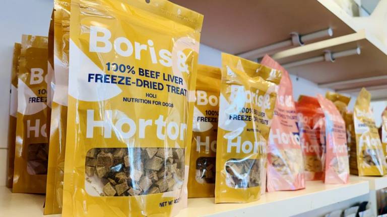 Boris &amp; Horton offers a variety of branded merchandise and treats for dogs along with its café services.