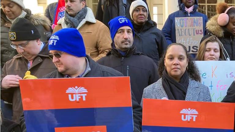 New York City teachers union members rally for paraprofessional raises in January, 2025. A bill that would grant $10,000 one-time pay bumps became law last week.