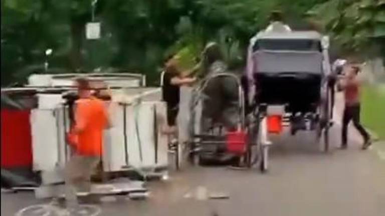 A teen died after he was tossed from a horse drawn carriage that overturned in Central Park shortly after 2:45 p.m. on June 17. A passerby appeared to finally grab the runaway horse as bystanders rushed to help.