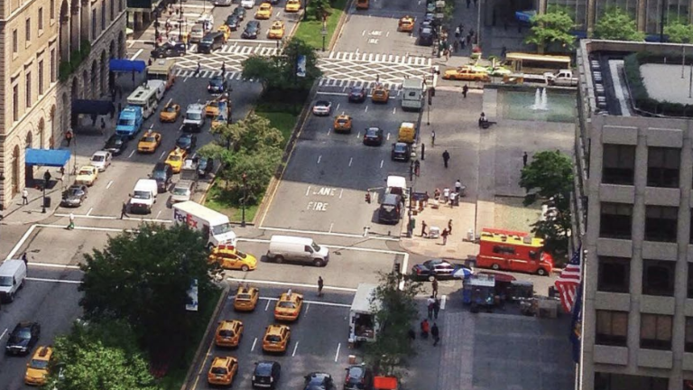 Park Avenue as it currently stands, with the green median and planters that gave the corridor its name in 1888.