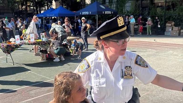 Deputy Inspector Noreen E. Lazarus, the commanding officer of the 19th Pct., was drafted into community relations duties when she helped a distraught youngster find her caregiver during a National Night Out Against Crime inside St. Catherine’s Park on Aug. 4.