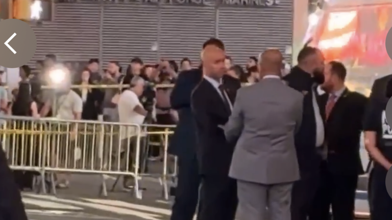 Detectives in Times Square on Aug. 31 after cops shot dead an emotionally disturbed woman who refused to drop two butcher knives after stabbing two people, killing one.